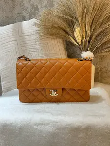 Pre-owned CHANEL Classic Flap Medium Bag in rare limited edition pumpkin spice caviar leather with shiny gold tone hardware 1919H0015