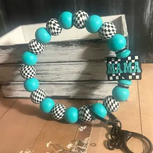 Silicone beaded wristlet keychain Black and white checkered turquoise with word MAMA on it