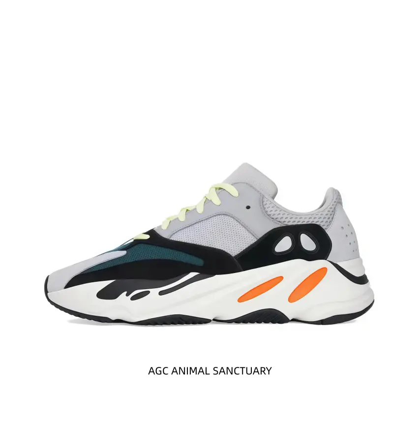 adidas Yeezy Boost 700 Wave Runner OG dad sneakers, full Boost cushioning midsole, iconic orange side accent retro colorway.