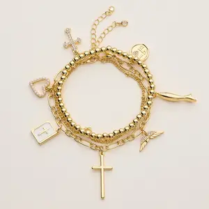 Cross Faith Charm Adjustable Bracelet Stack with Cross Heart Angel Wings Ichthys Fish Medallions Gold Bead Layered Set