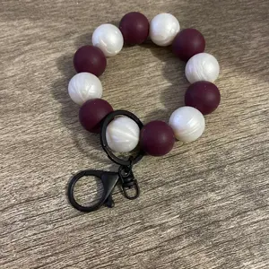 Mini Burgundy/Pearl Wristlet