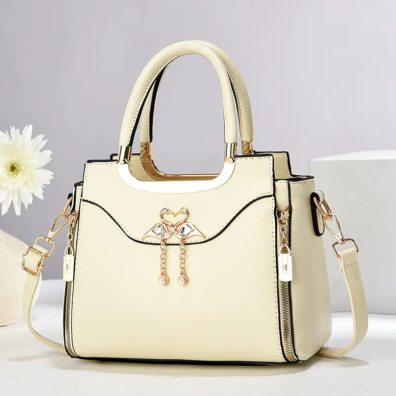 Women's Elegant Handbag with Detachable Shoulder Strap, Gold Hardware Accessories and Heart-Shaped Wing Pendant, Ideal for Casual & Formal Occasions, Elegant Bags