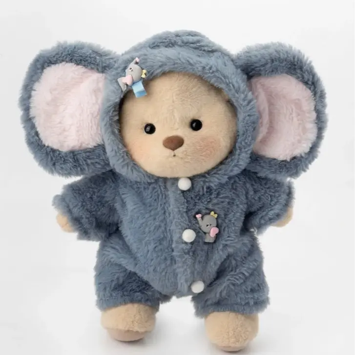 Fluffy Little Elephant With Brown Bear