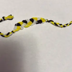 Handwoven bee themed embroidery floss bracelet