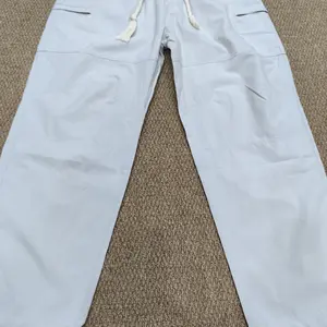 Men's Loose  Pocket Drawstring Waist Cargo Pants Casual Comfy Zipper Cargo Pants for Daily Outdoor Wear Baggy Trousers in