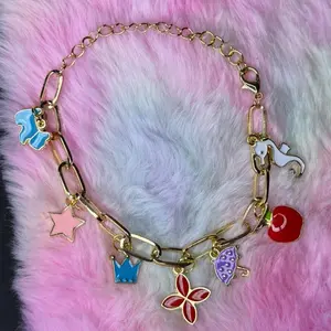 Handmade Freestyle Charm Bracelets with Colorful Enamel Charms Including Unicorn Star Flower Pendants and Gold Chain