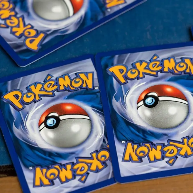 10 Pokémon Cards including at least 1 EX, V, VSTAR, VMAX