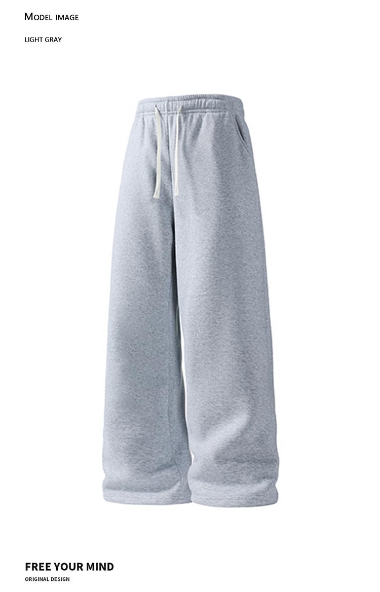 Pack of 4 men’s casual long pants featuring a drawstring elastic waistband and a loose fit for comfort and versatility. Suitable for everyday wear, leisure, sports, and fitness in spring and autumn.