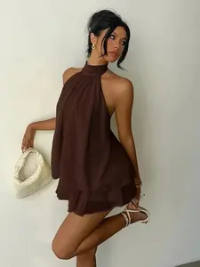 Elegant women' s slim-fit sexy backless halter waist-cinched puff short dress with tie straps; elegant women'Sdress