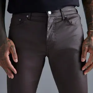 Unisex Chocolate Skinny stacked zip hem coated jeans