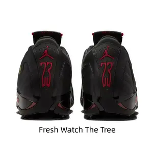 All Black Mid Basketball Sneakers Bold Red Jumpman & Number 23 Embroidery Red Heel Tab Gloss Red Side Accent Panels Stitched Textured Heel Counter