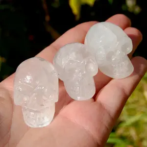 ONE 1.5" Clear Quartz Crystal Skull, Primitive Style Carving