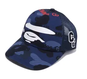 Bape x Comme Des Garcons Osaka Trucker Hat Blue Camo
