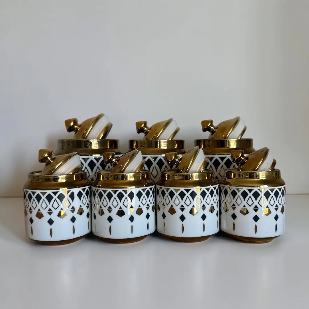 7 Piece Ceramic Canister Spice Jar Set with a Stand and Air Tight Lids, Moroccan trellis Gold and Dark Diamond like pattern Delicate and Useful Dark and Gold create an organic, sophisticated aesthetic Premium Home Decor