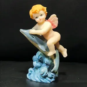 Vintage Resin Angel Collectible Cherub Figurine with Dolphin Peach Pink Wings and Blue Wave Base