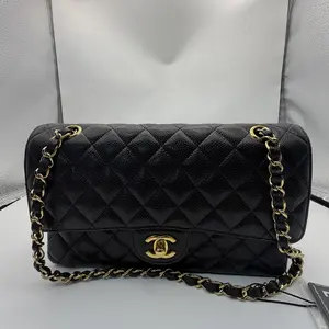 Pre-owned CHANEL Medium Classic Flap bag in black caviar leather with double flap and gold hardware
