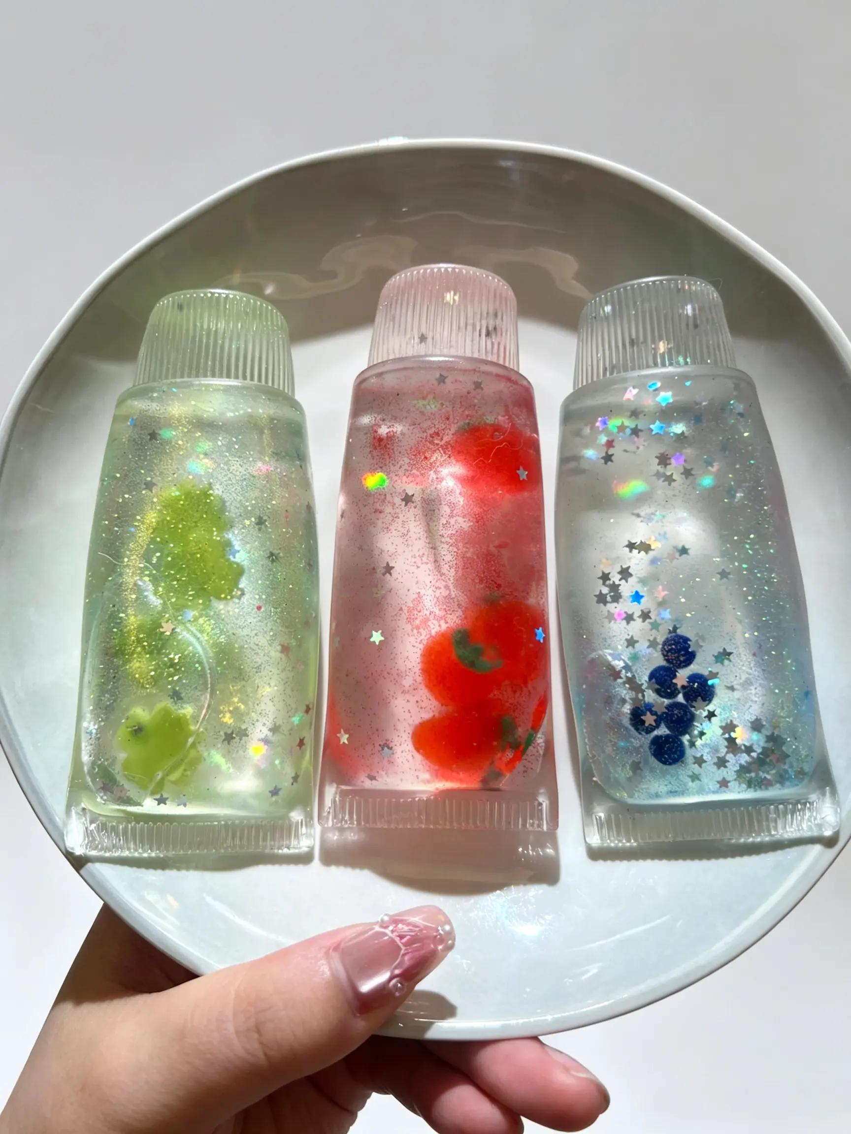 Glitter Clear Toothpaste Tube Squishy Toy - Fruit Liquid Stress Relief Fidget Toy with 3 Styles (4-Leaf Clover, Strawberry, Blueberry) - Perfect Holiday Gift for Kids