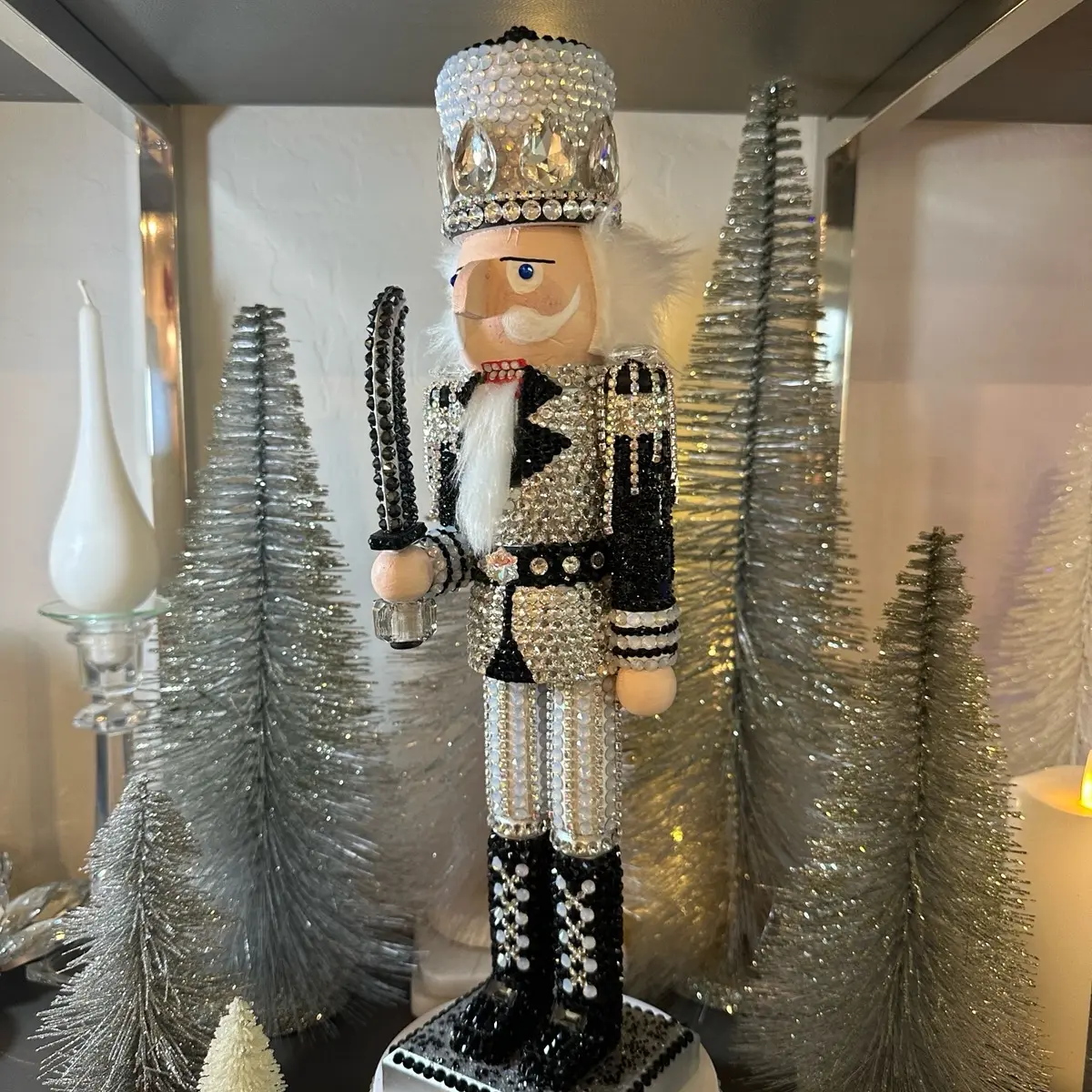 Nutcracker in silver, white and black colors and also red, black silver.