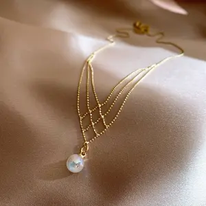 Elegant V-Shaped Tassel Pearl Necklace