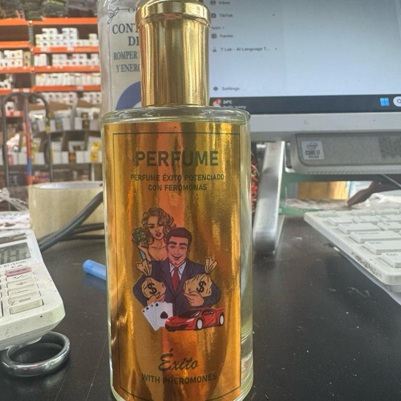 Exito Perfume with Pheromones for Women - Exotic Fragrance to Enhance Confidence and Elegance - Ideal for Personal and Professional Success Captivating Oud Citrus Floral Woody