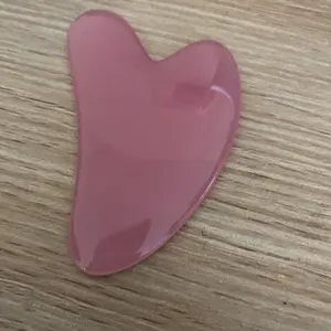 A gua sha stone Facial Stone