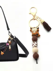 Highland Cow Silicone Beaded Keychain with Tassel, Cute Bag Charm, Cartoon Punk Style, Animal Theme, Ideal Gift for Friends, Bag Pendant Keychain