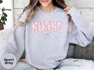 Pink Nurse Toile Bow Sweatshirt, Stethoscope Coquette Soft Girl Gift, Registered Nurse Graduation Crewneck Womenswear Hoodie