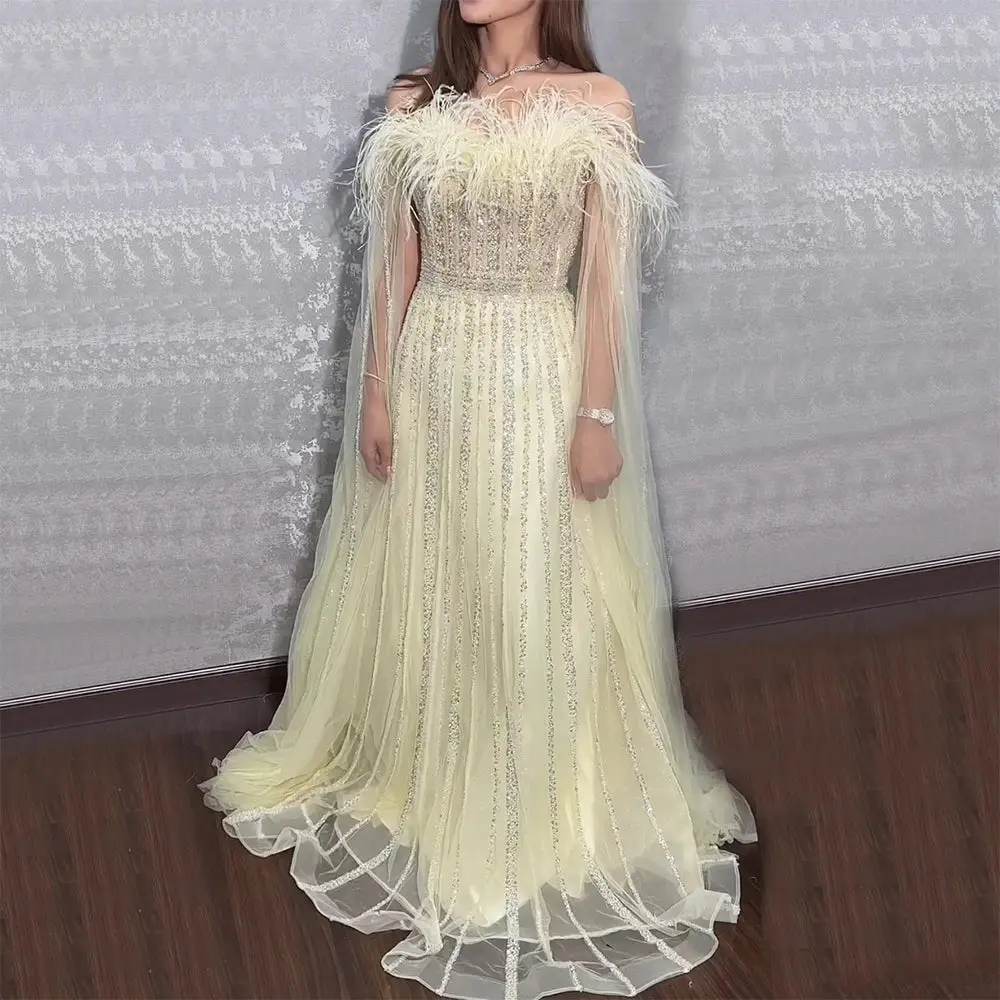 Sunny Opulence: Yellow A-Line Gown with Cape Sleeves, Beads, and Feathers – 2025 Arabic Wedding Party Ensemble