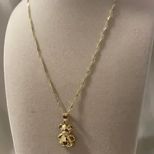 14k gold 21.5" chain with a bear pendant