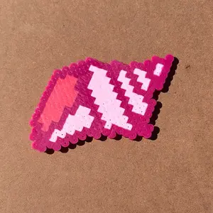 Pretty pink shell made from perler beads