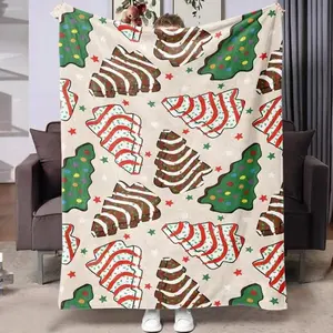 This Christmas Tree Cake Pattern Flannel Blanket Is A Warm and Cozy Nap Blanket. Soft, Skin-friendly, and Warm, with A Festive Cookie Print, It's The Perfect Gift for Holiday Home Decor.