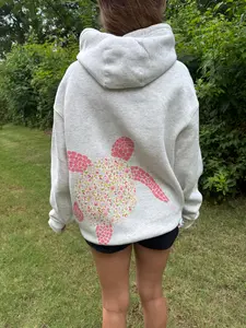 Cozy Ocean Turtle hoodie floral turtle vinyl and embroidery front.