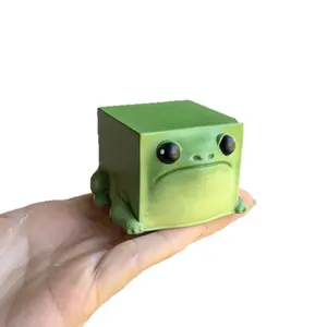 Cute Frog Figurine Adorable Green Cube Design with Expressive Eyes Smooth Matte Finish Small Handheld Size for Home Decor and Collectibles