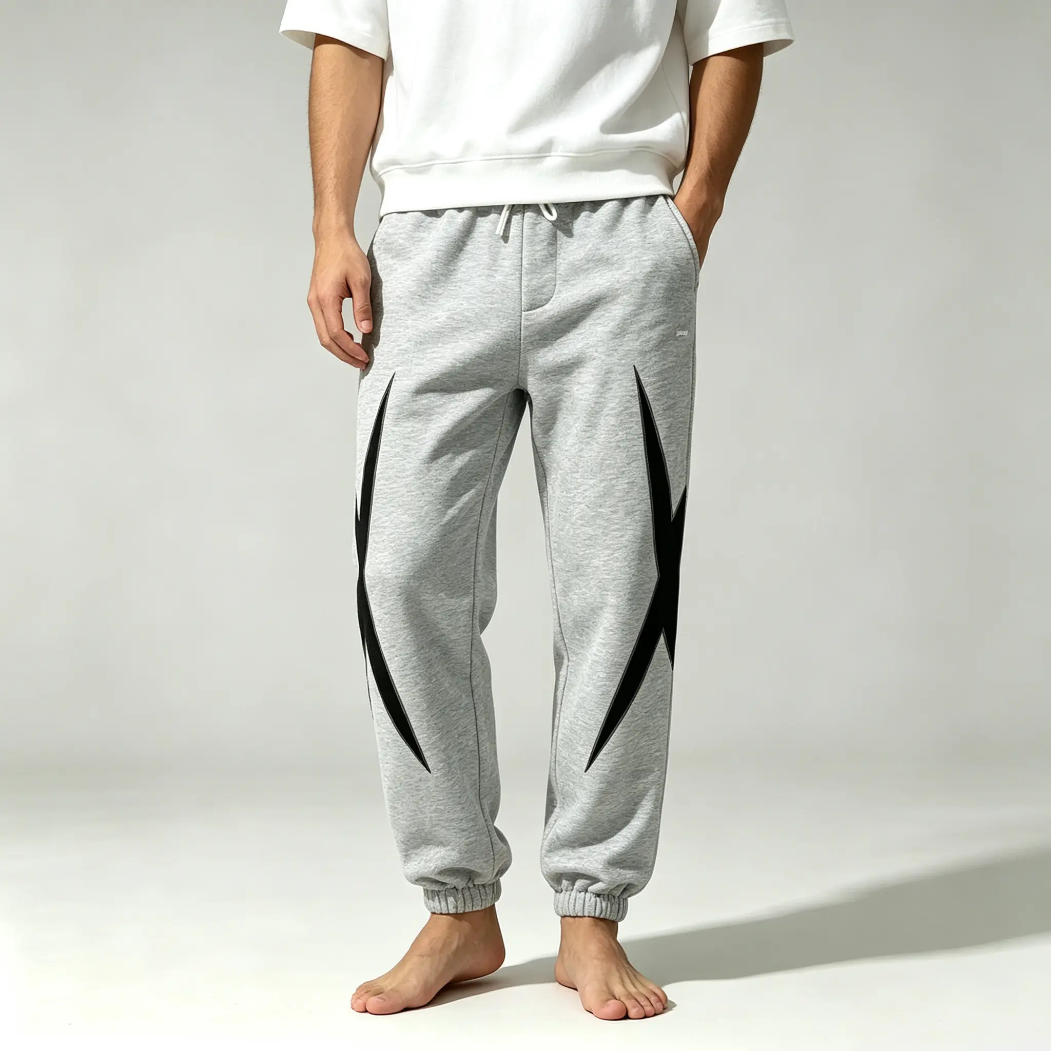 Men’s spring/autumn athletic sweatpants with star print along the side seams, elastic drawstring, high waist, loose casual long pants, trendy and versatile tapered street-style joggers for running.