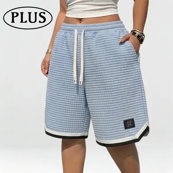 Plus-size women’s waffle knit shorts with elastic drawstring waist, summer casual style, stretchy, breathable, soft fabric, solid gray versatile plus-size women’s shorts, tropical style.
