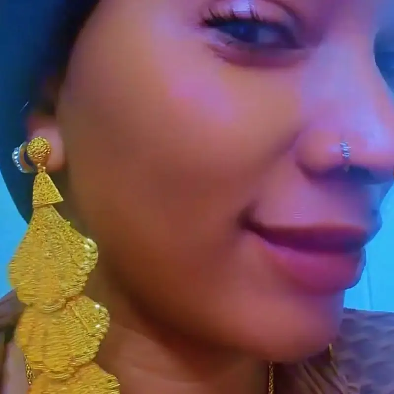 SLJ 24k gold plated long earring with shell design