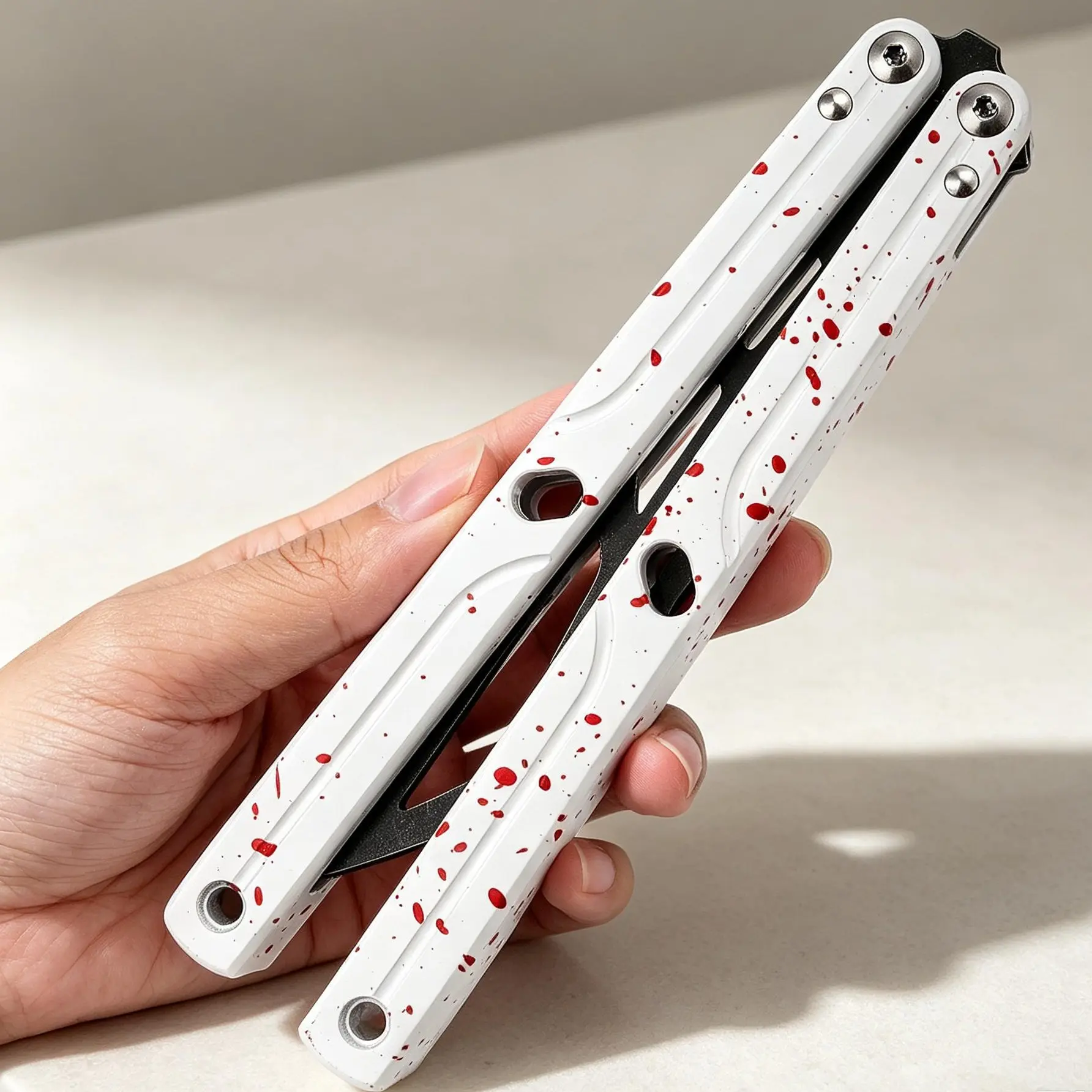 Novice Folded Knife Trainer - Non-Blade, White and Red Polka Dot Color Scheme