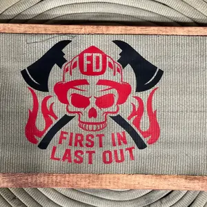 Fire Hose Sign for a firefighter. The sign has the Firefighter "First in, last out" words with the skull.  The vinyl graphics are heat pressed into use fire hose
