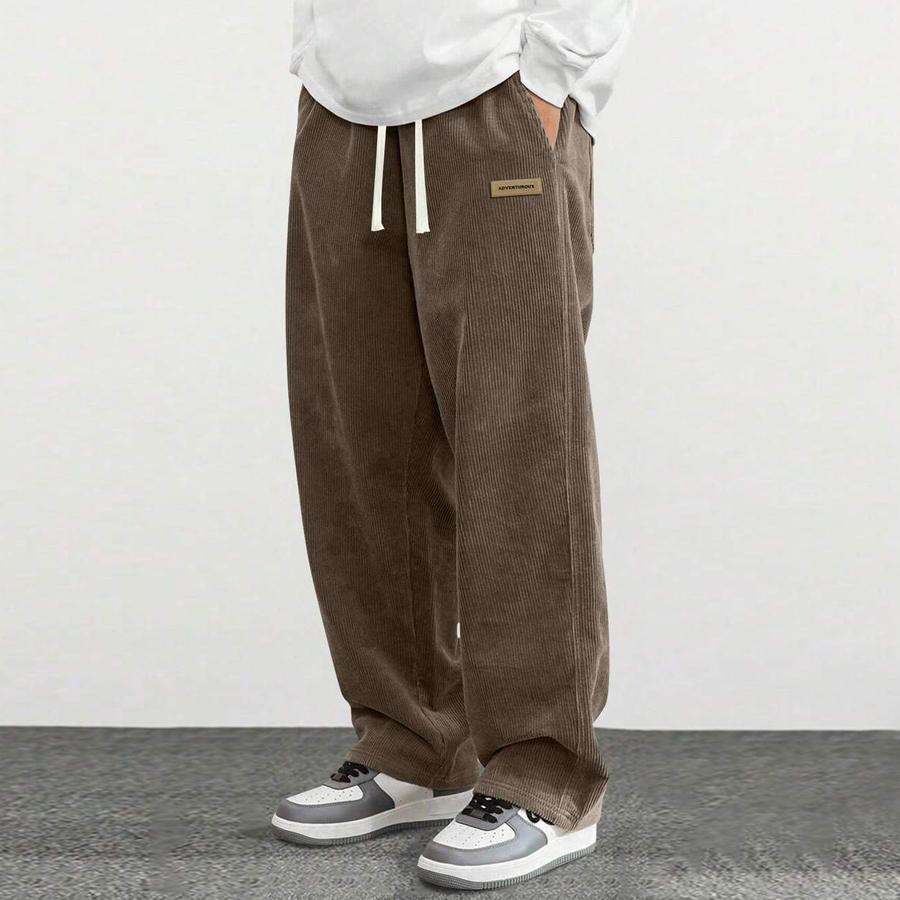 Men’s corduroy casual pants, loose straight fit, simple and versatile, suitable for spring and autumn wear.