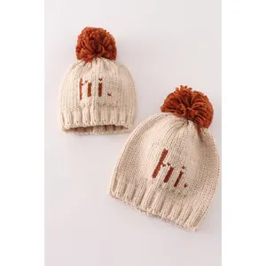 Beige Pompom Hi Cable Beanie