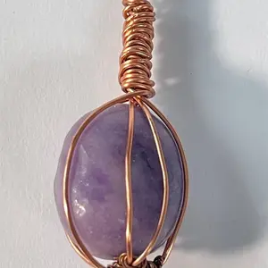 Lepidolite Crystal Pendant wrapped in pure copper wire, on a rose gold plated copper necklace.