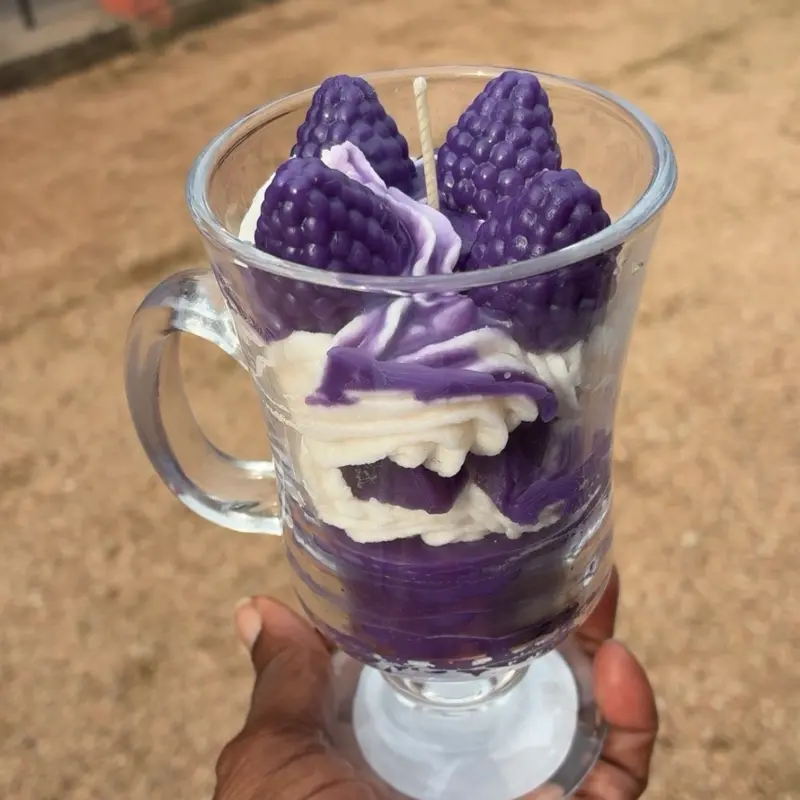 Raspberry Dream Candle in Elegant Glass Cup with Purple Berry Design and Creamy Texture