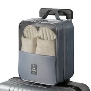 Travel-friendly shoe storage bag with large capacity for shoe storage. Made of durable, dust-proof and breathable materials, it is equipped with an ergonomic handle, making it an ideal choice for compact travel storage, Travel Organization Pouch