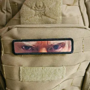 mug shot eyes watching you 1"x4" removable patch with hook and loop backing