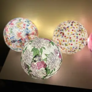 Paper Máché light up  glass garden globes.