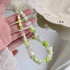 Green floral bead mobile phone pendant, paired with acrylic crystal beads, pearls, and butterfly embellishments - fashionable anti lost rope camera and mobile phone accessories, decorations, Phone Charm, Phone Lanyard, Flowers