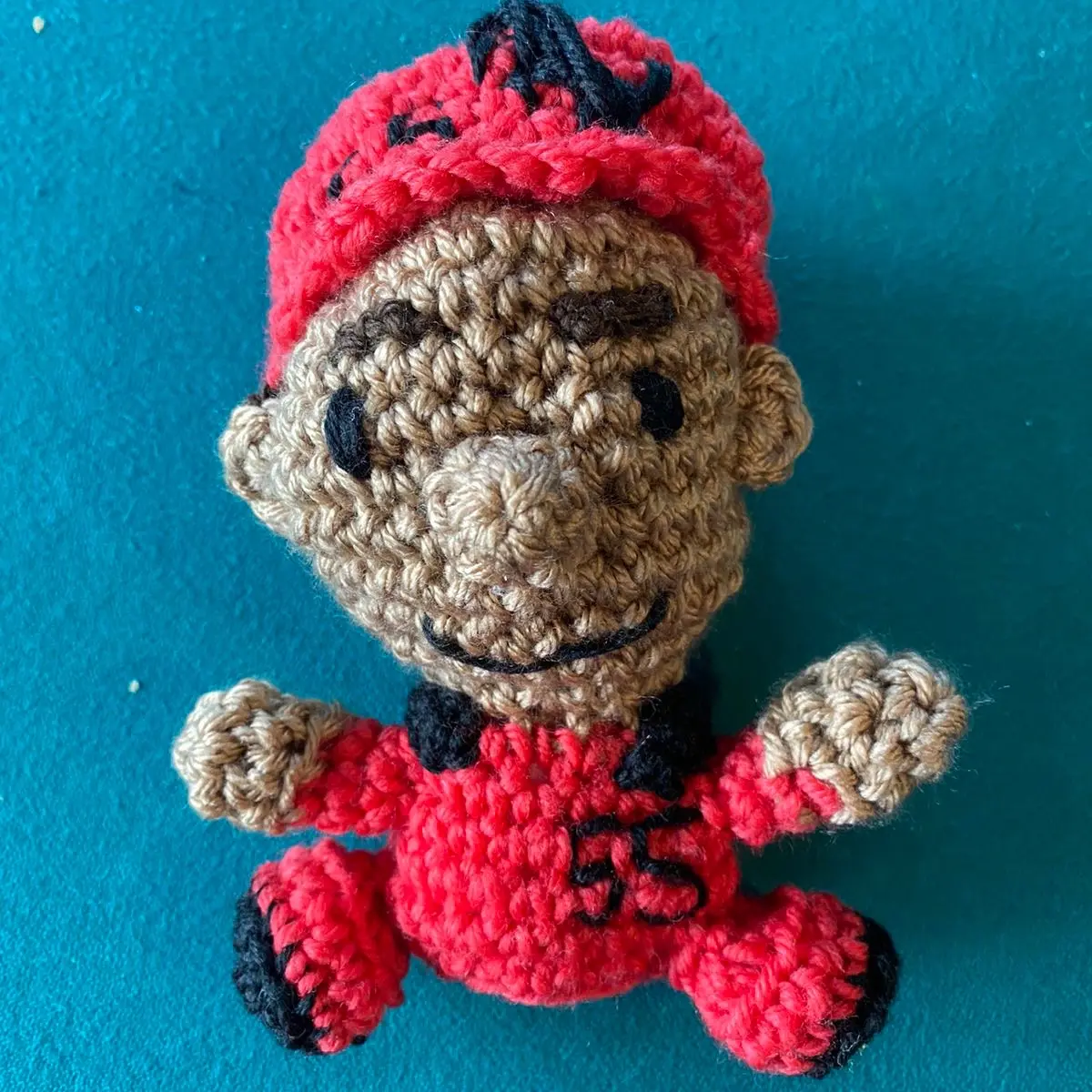 Mini Carlos Sainz crocheted amigurumi doll