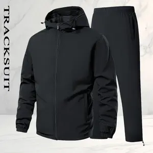 Men’s two-piece hooded sports set with an American casual athletic style. Durable, wrinkle-resistant, waterproof fabric provides windproof protection against rain and cold; adjustable drawstring hood for a snug fit around the head; smooth, durable zipper