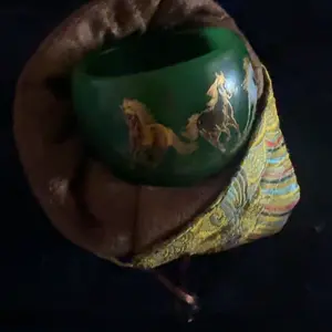 Handmade tea cup with jade green glaze and gold painted Eight Horses, master cup