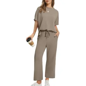 Women’s summer two-piece loungewear set, oversized crop top with wide leg pants, perfect for airport, beach and vacation wear.